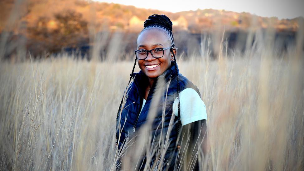 Person standing in a field